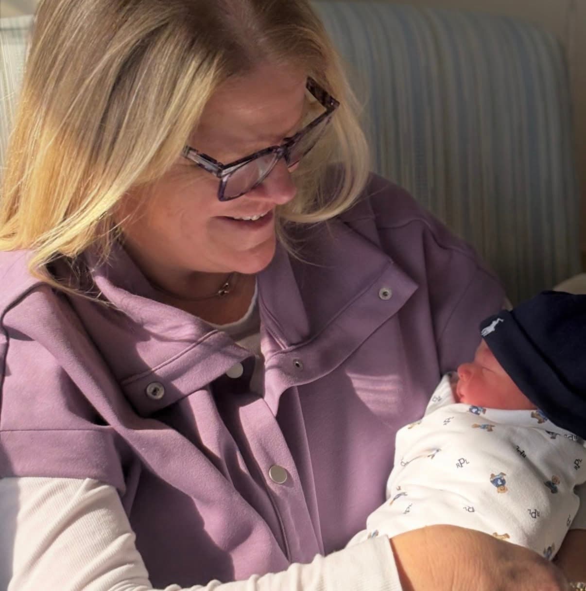 Farrell Kelly with a newborn